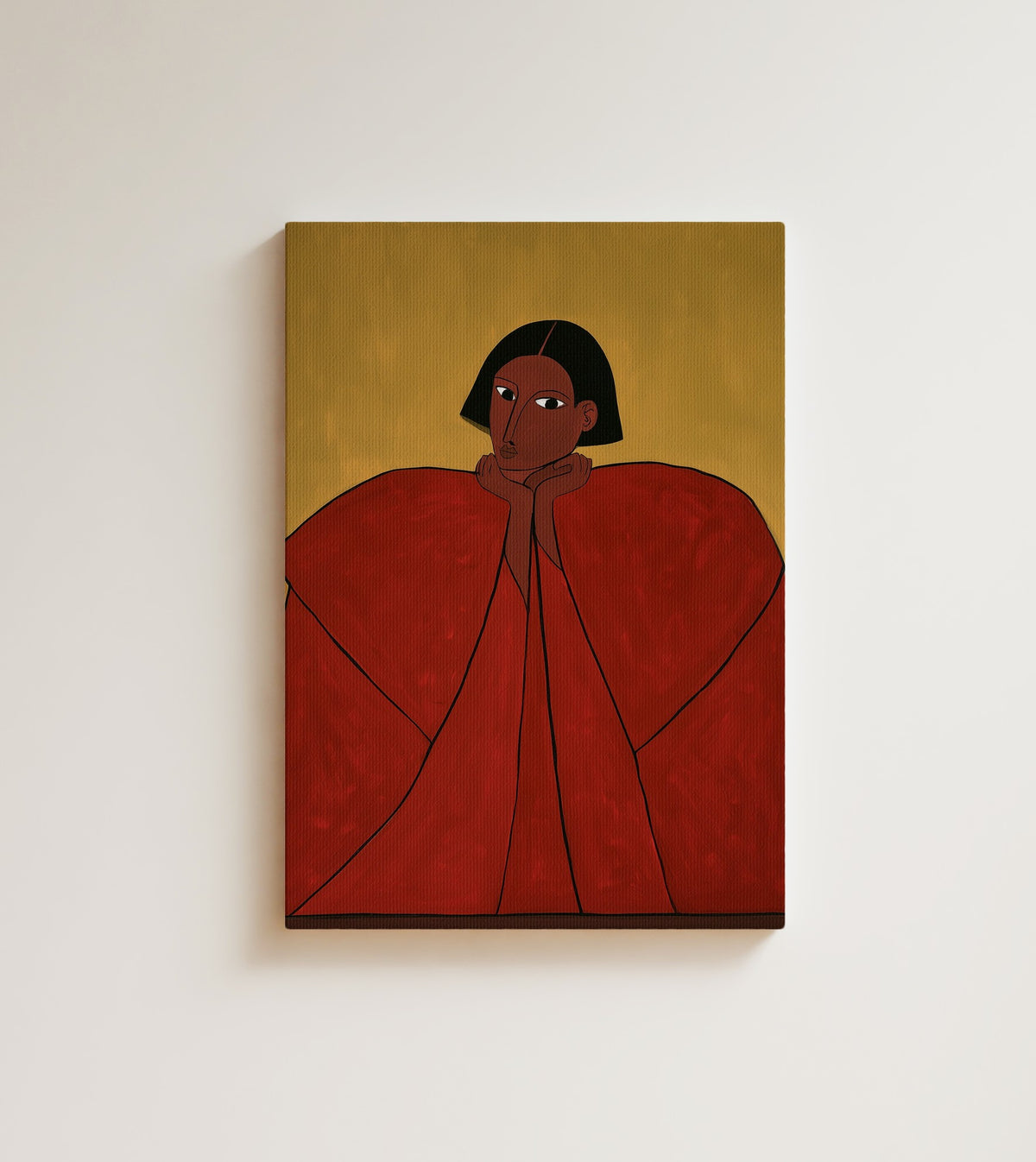 Crimson Repose: A woman with a dark bob, wrapped in a huge crimson red cape. Canvas wall art, shown on a plain wall