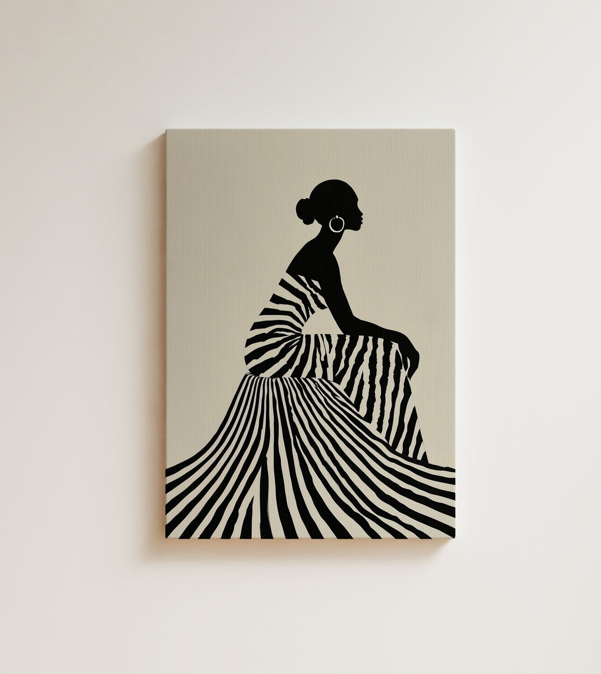 Line and Grace: A Black woman in profile, hair in a low bun, a striped gown opening wide across warm beige. Canvas wall art, shown on a plain wall