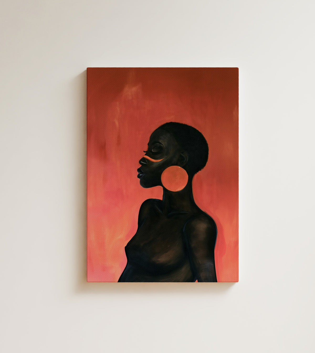 Copper Hoop: A Black woman in profile, a stripe of orange paint across her cheek and a round orange earring. Canvas wall art, shown on a plain wall