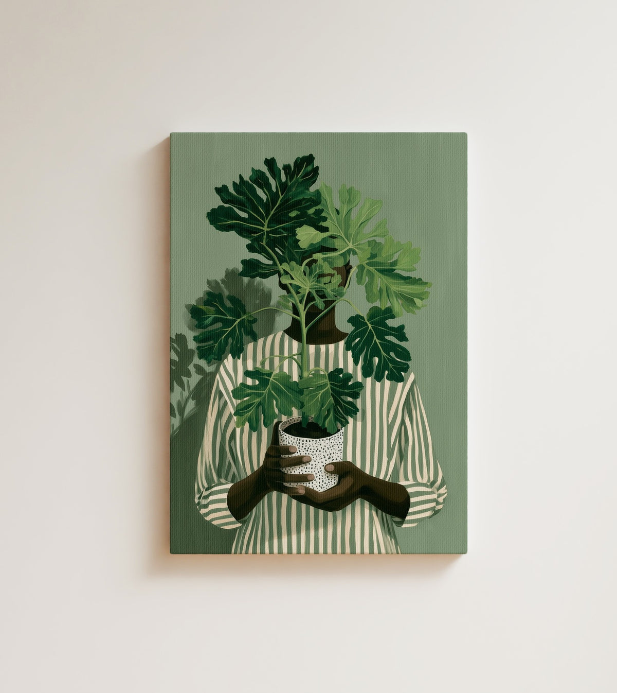 Quiet Growth: A Black woman in a striped shirt holds a potted plant whose leaves bloom where her face should be. Canvas wall art, shown on a plain wall