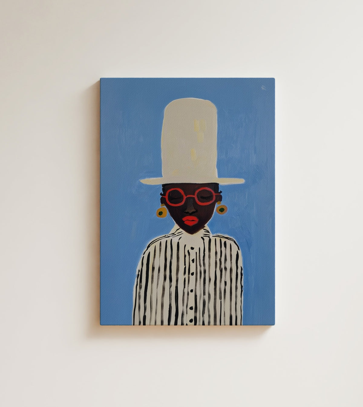 Elevation: A Black woman in a tall white top hat and round red glasses. Canvas wall art, shown on a plain wall