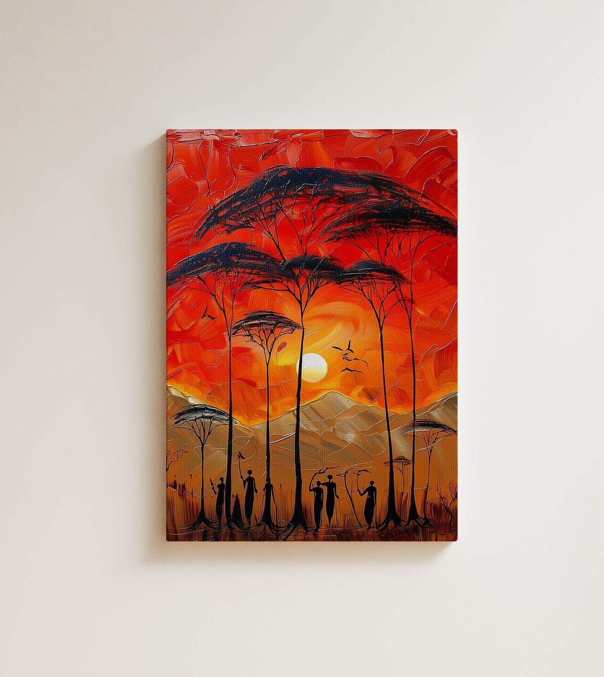 Ember Horizon: A line of small figures walks across an African savanna beneath a fiery orange sky. Canvas wall art, shown on a plain wall