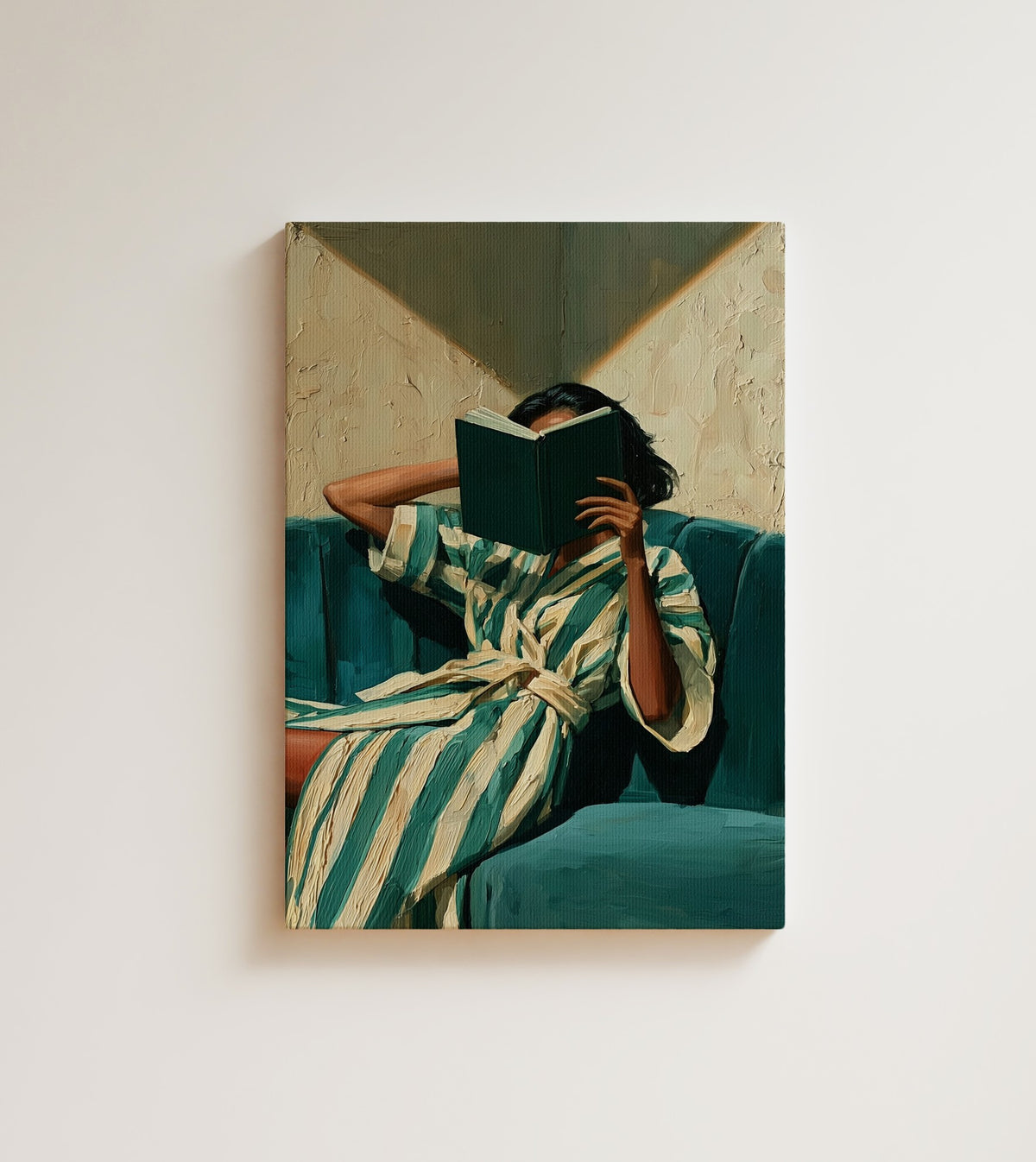 The Reader: A Black woman folded into a teal velvet chair. Canvas wall art, shown on a plain wall