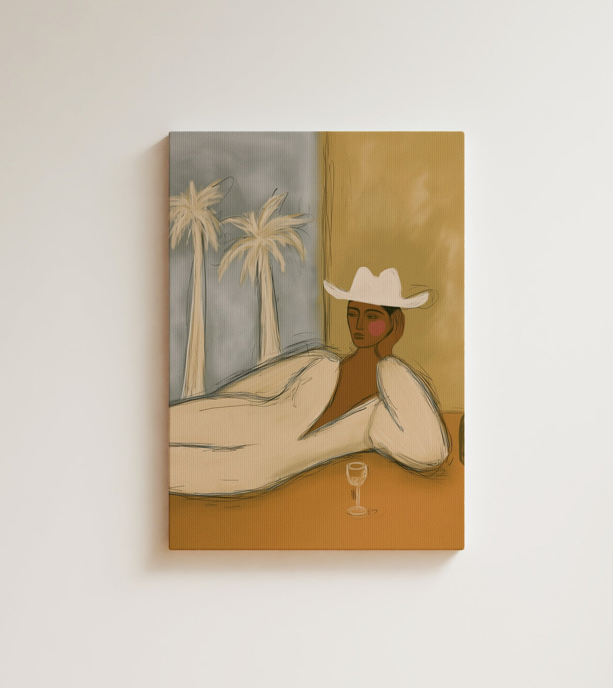 Reclining Figure with Palms: A cowgirl in a white hat and cream suit reclines beside a glass of wine. Canvas wall art, shown on a plain wall