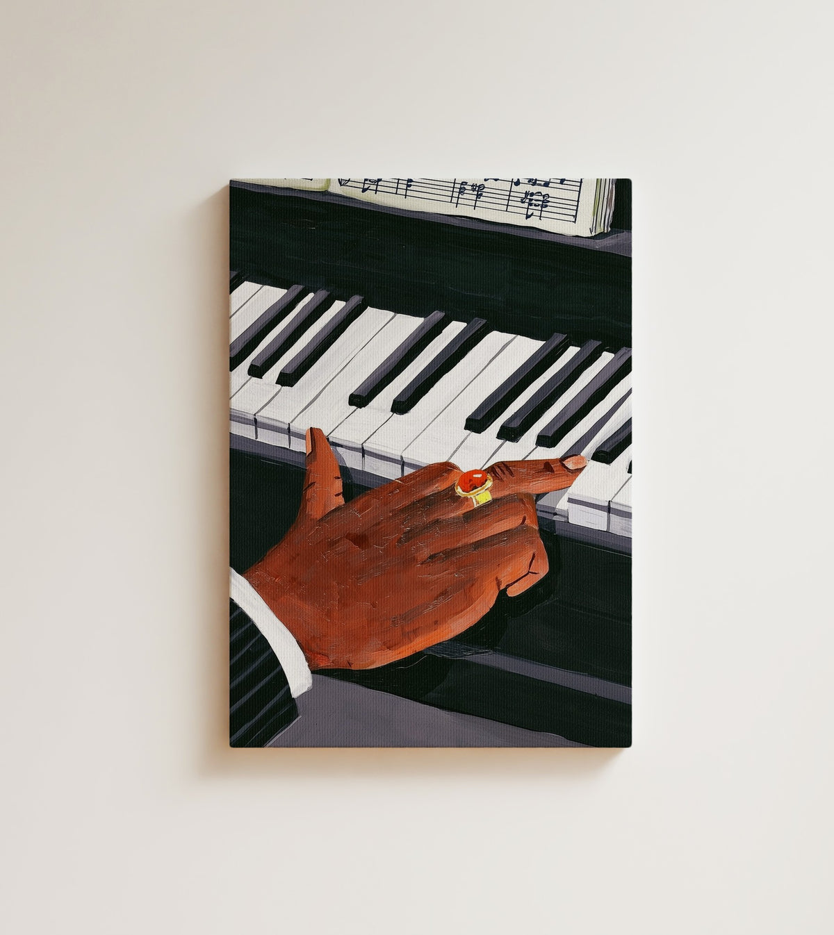 The Pianist's Hand: A Black pianist's hand rests on the keys, a gold ring catching the light. Canvas wall art, shown on a plain wall