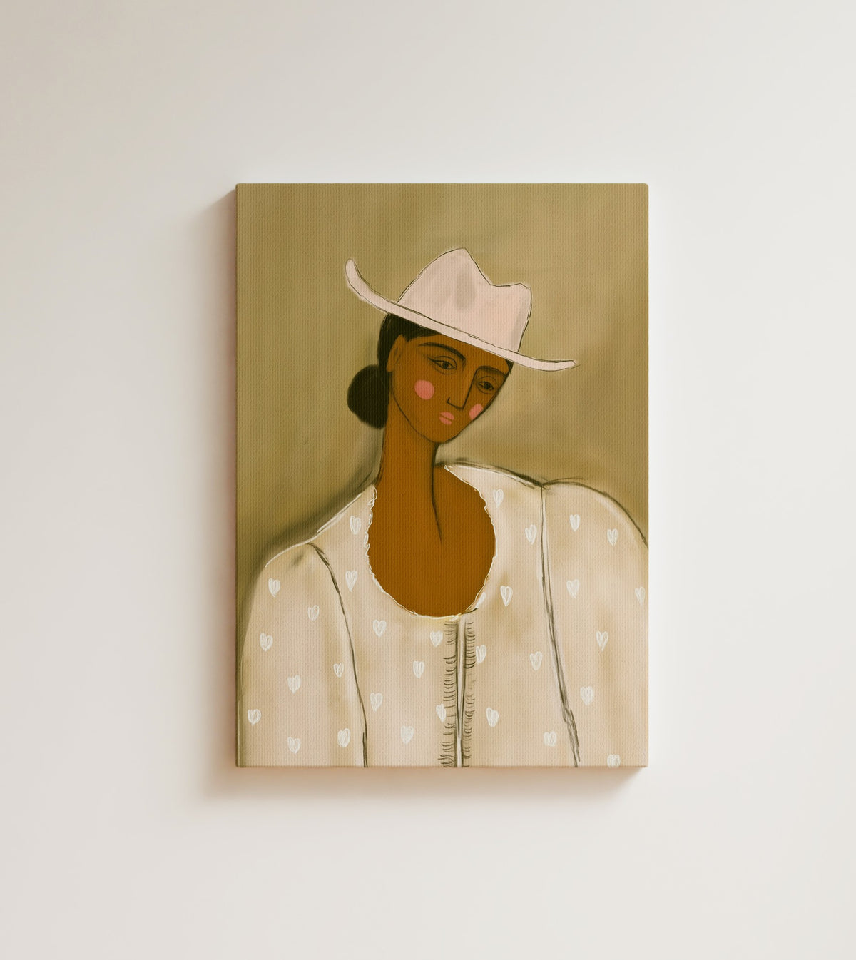 Girl in Stetson: A white hat, pink cheeks and a blouse full of tiny hearts. Canvas wall art, shown on a plain wall