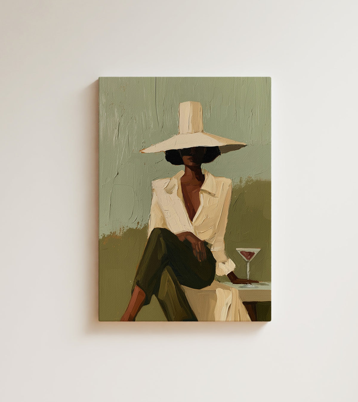 Lady with a Martini: some evenings only need one good drink and a wide hat. Canvas wall art, shown on a plain wall
