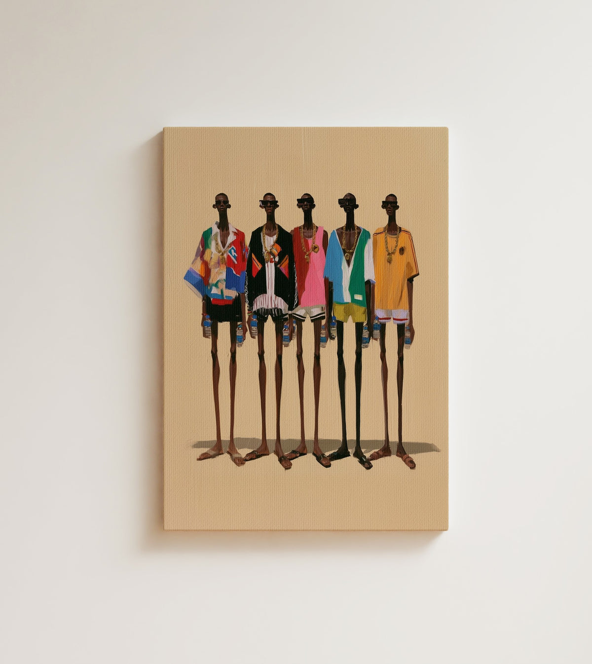 The Crew: five tall Black men in bold streetwear and gold chains stand shoulder to shoulder against warm sand. Canvas wall art, shown on a plain wall