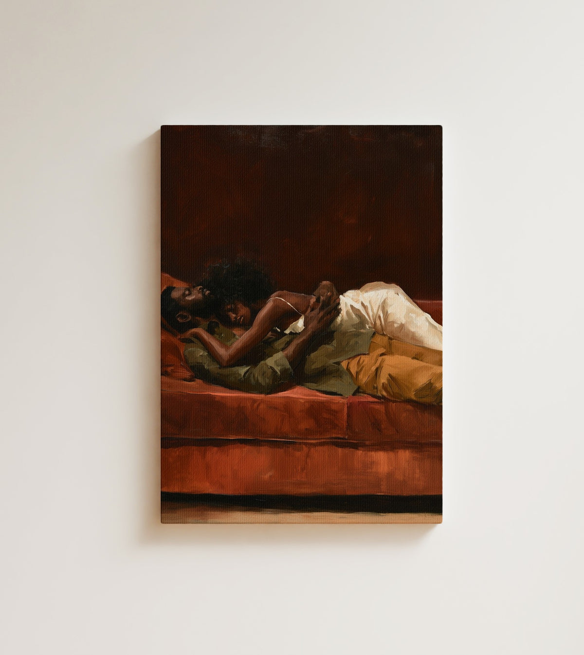 Slow Afternoon: A couple lies together on a rust red sofa, her afro on his chest. Canvas wall art, shown on a plain wall