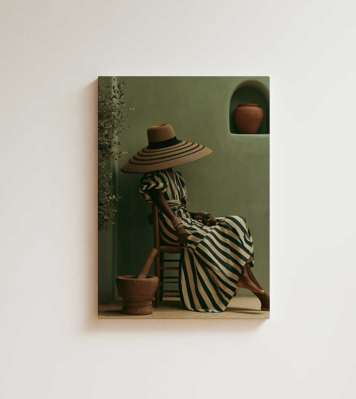 The Striped Hat: A faceless African woman sits on a wooden chair in a striped dress and a wide straw hat. Canvas wall art, shown on a plain wall
