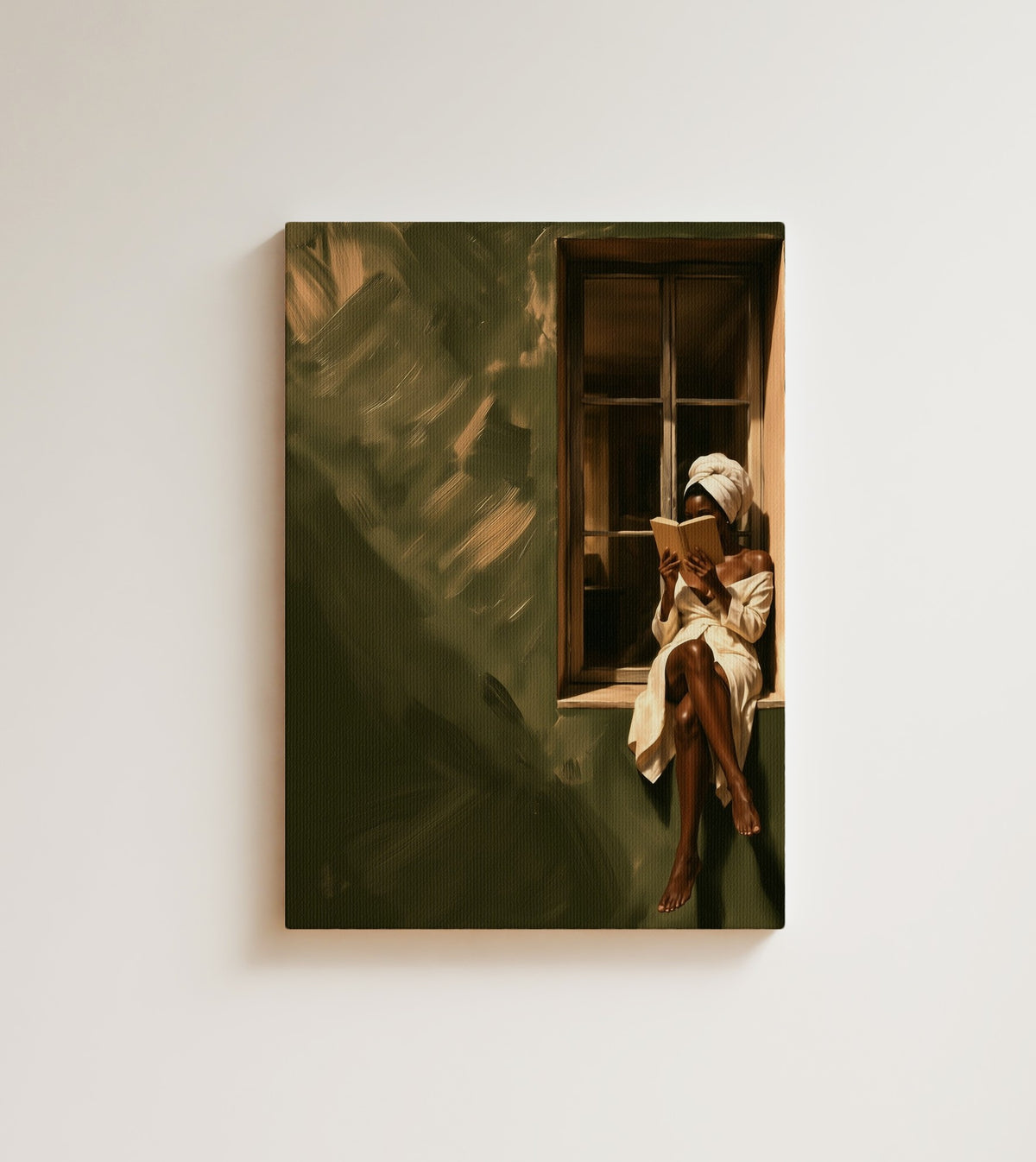 Reading by the Window: A woman in a white robe and towel reads on a window sill against a deep olive green wall. Canvas wall art, shown on a plain wall