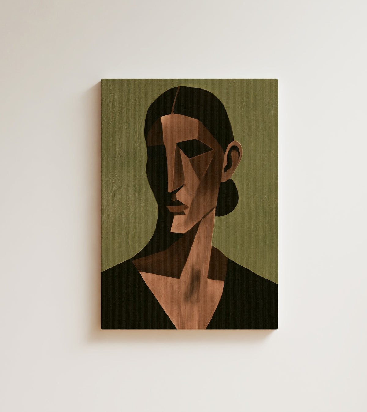 Quiet Geometry: A cubist portrait of a woman in brown, tan and rose planes, with a low bun and a black top. Canvas wall art, shown on a plain wall