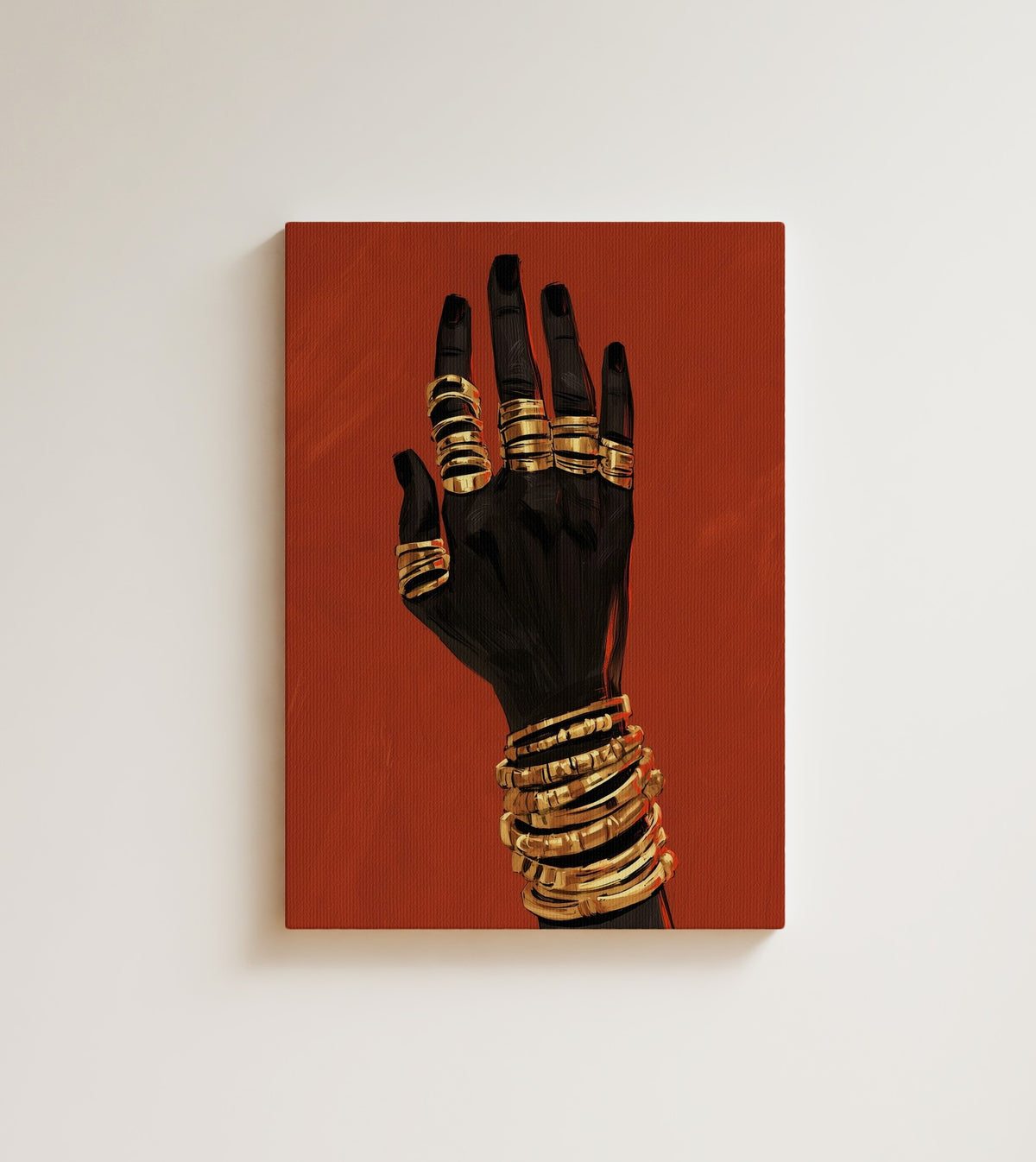 Hand in Gold: A raised hand stacked with gold rings and layered bangles, set against a deep terracotta background. Canvas wall art, shown on a plain wall