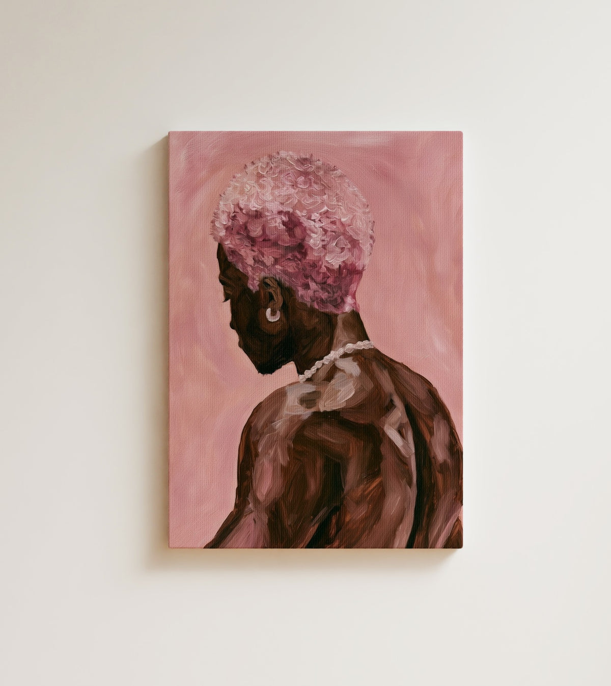 Man with Pink Blossoms: soft and strong were never opposites. Canvas wall art, shown on a plain wall