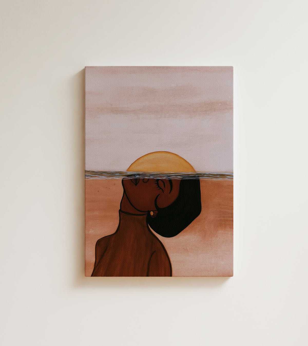 Moonrise Within: A Black woman in profile, her hair in a low bun. Canvas wall art, shown on a plain wall