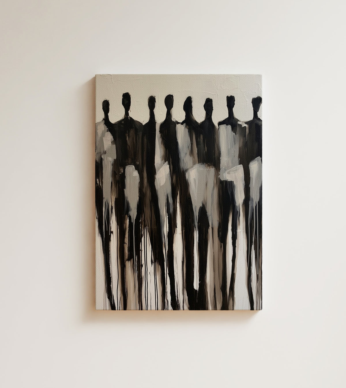 Procession: eight tall figures stand together in black, grey and white paint that drips toward the floor. Canvas wall art, shown on a plain wall
