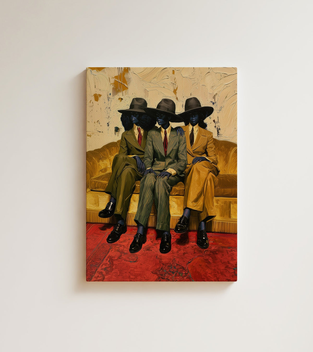 Three on the Sofa: three Black women in vintage suits and wide brim hats sit together on a gold velvet sofa above a red rug. Canvas wall art, shown on a plain wall