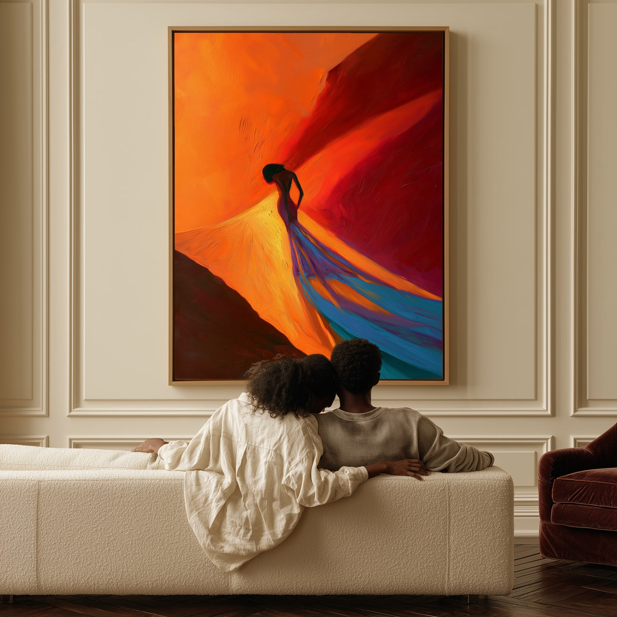 Into the Wind canvas above a sofa, a couple sitting together