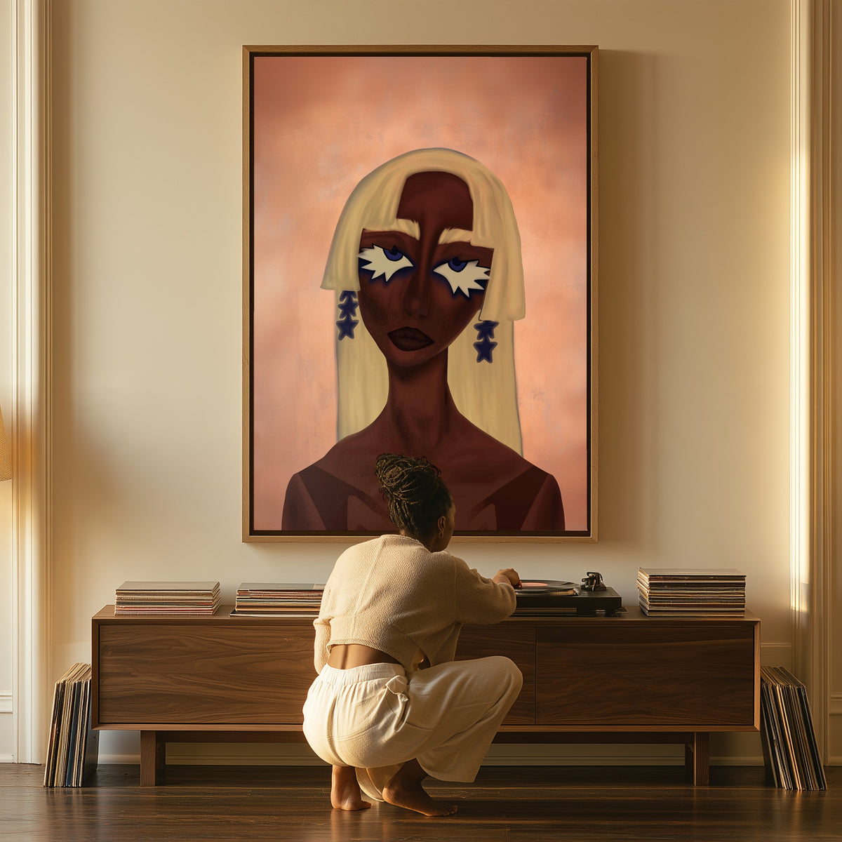 Woman with Painted Stars canvas above a console table, a woman beside it