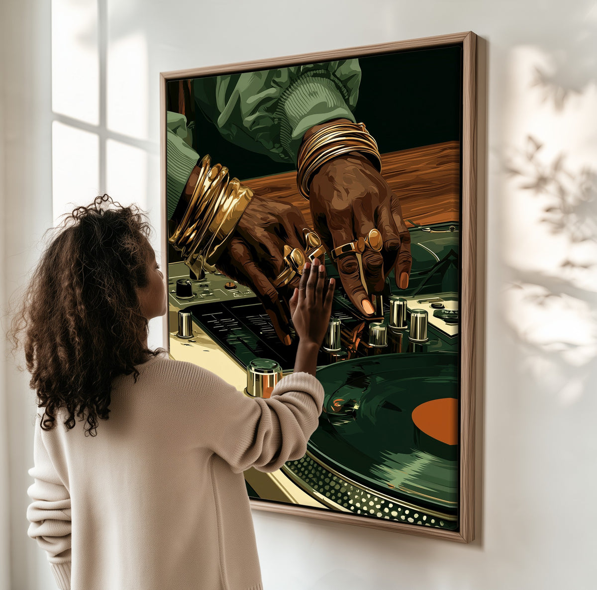 The Selector framed canvas, a woman hanging it on a sunlit wall