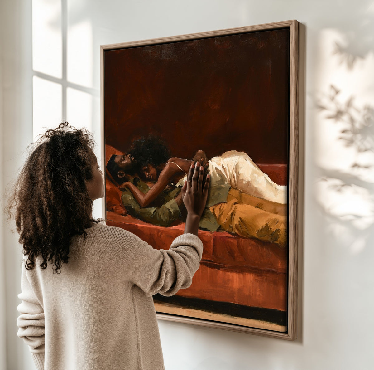 Slow Afternoon framed canvas, a woman hanging it on a sunlit wall