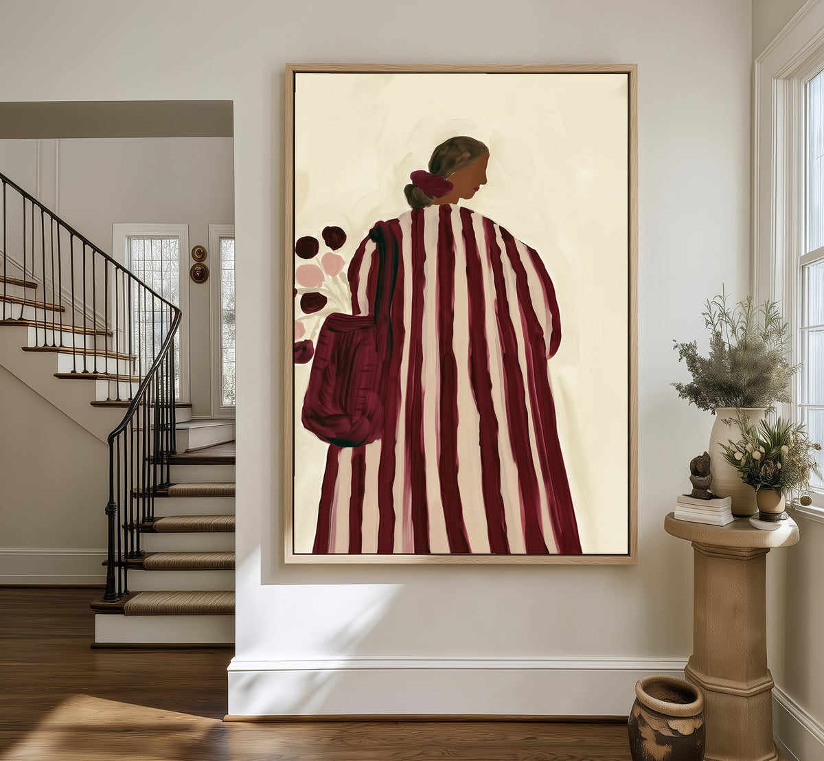 Walking Away framed canvas in an entryway by the stairs