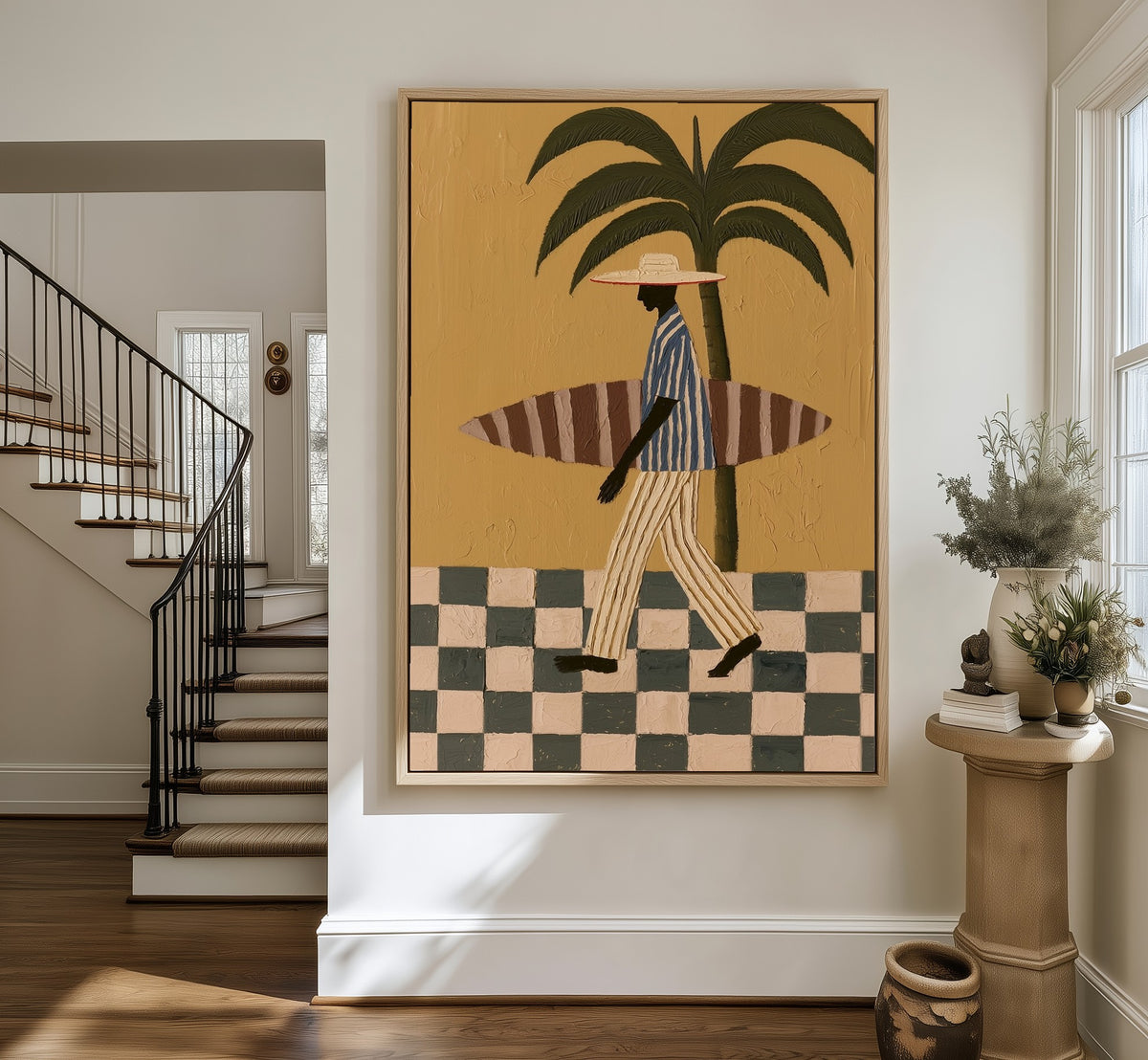 The Surfer framed canvas in an entryway by the stairs