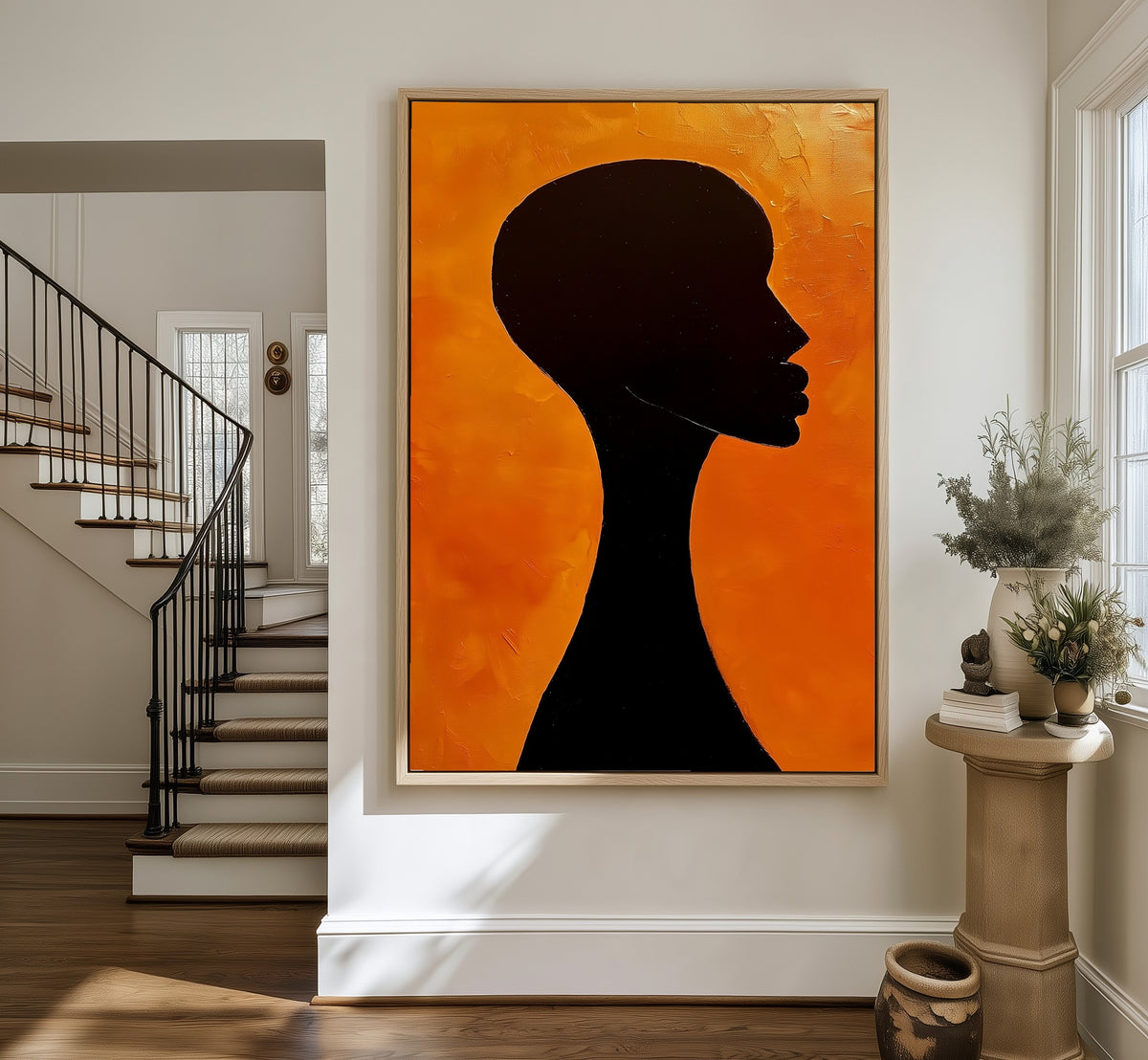Solitude framed canvas in an entryway by the stairs