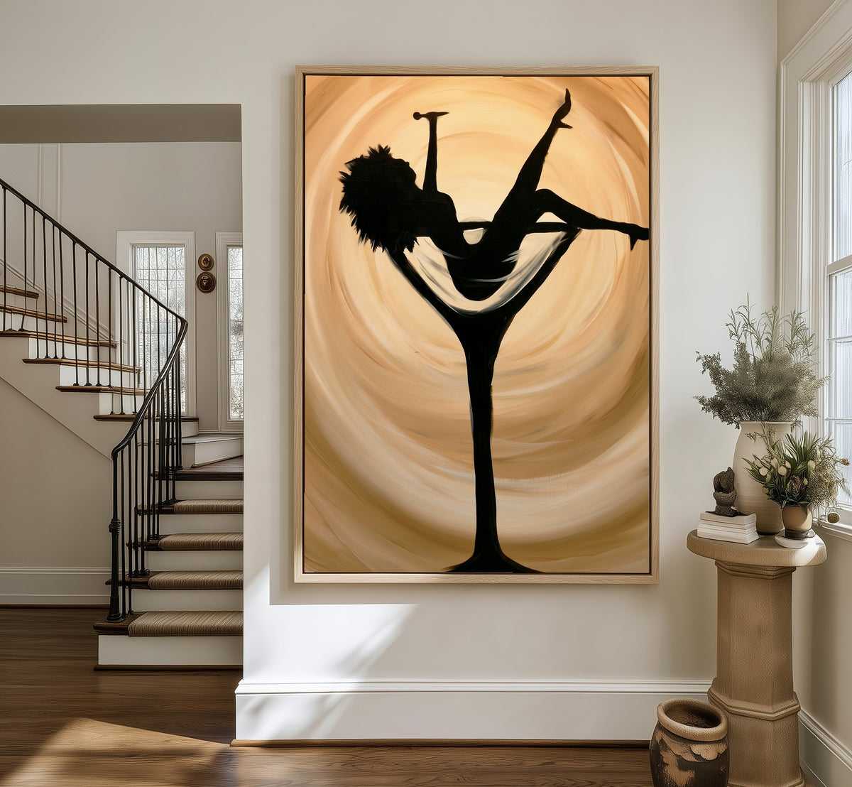 Woman in the Glass framed canvas in an entryway by the stairs