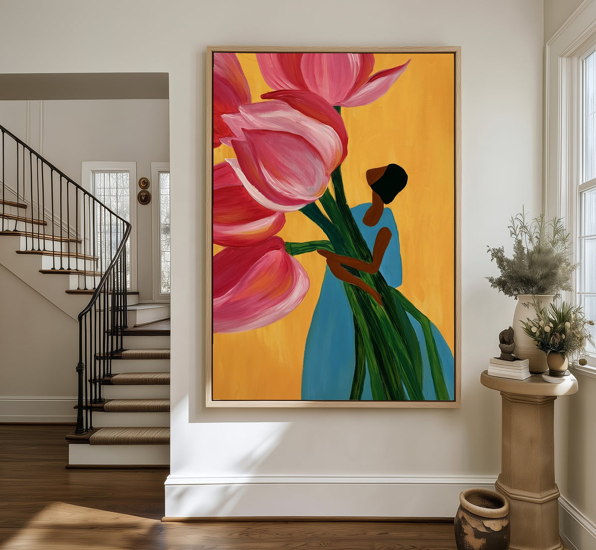 Carrying Spring framed canvas in an entryway by the stairs