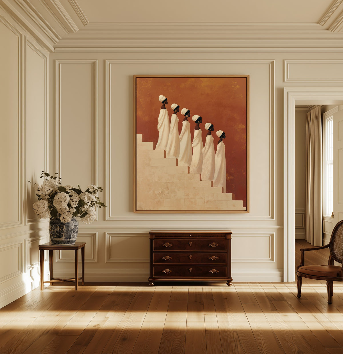 The Procession canvas above a dark wood chest in a hallway