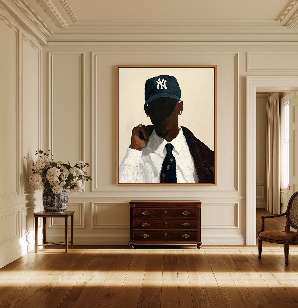 Man in Navy Cap canvas above a dark wood chest in a hallway
