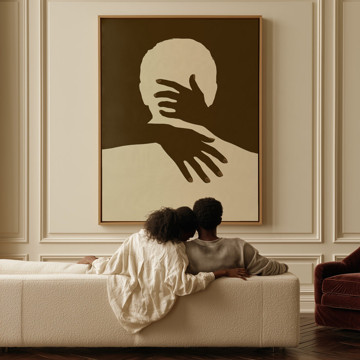 Held canvas above a sofa, a couple sitting together