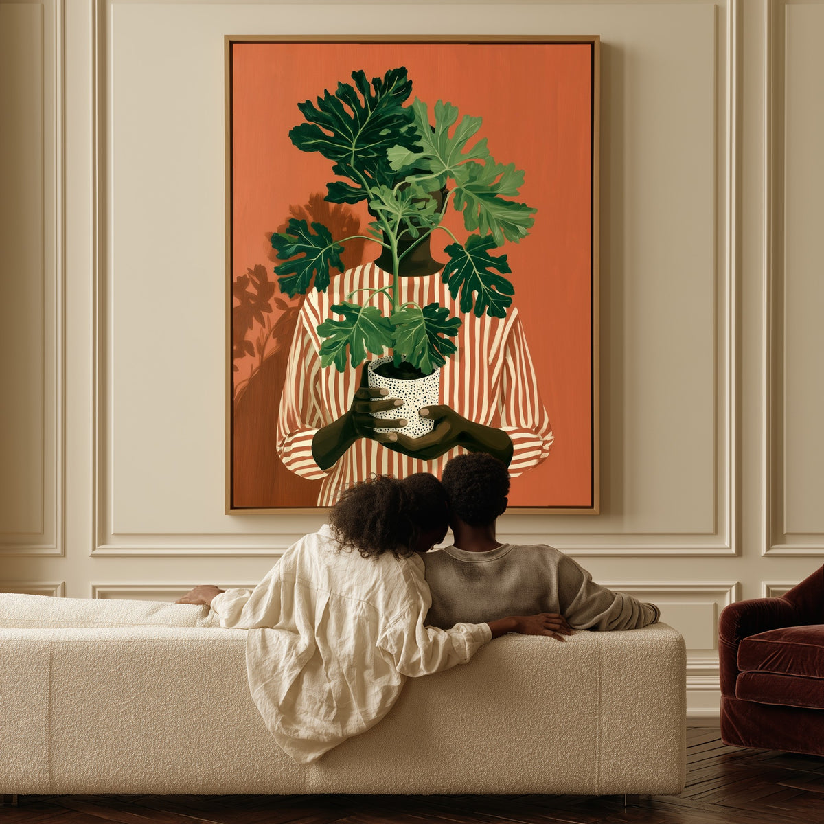 Rooted Warmth canvas above a sofa, a couple sitting together