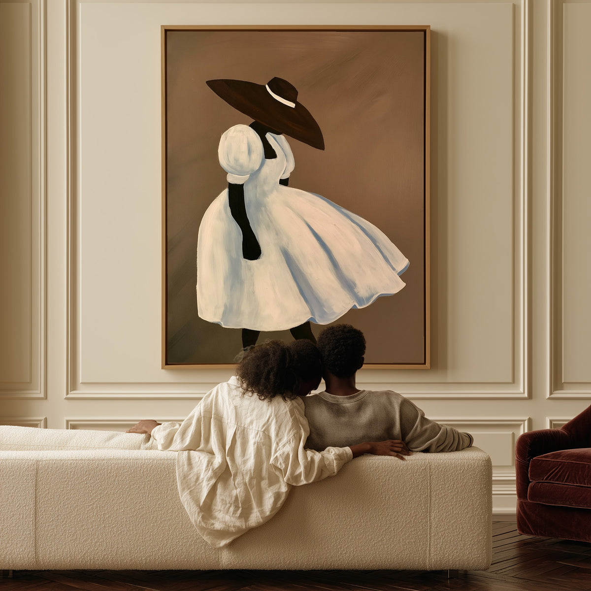The White Dress canvas above a sofa, a couple sitting together