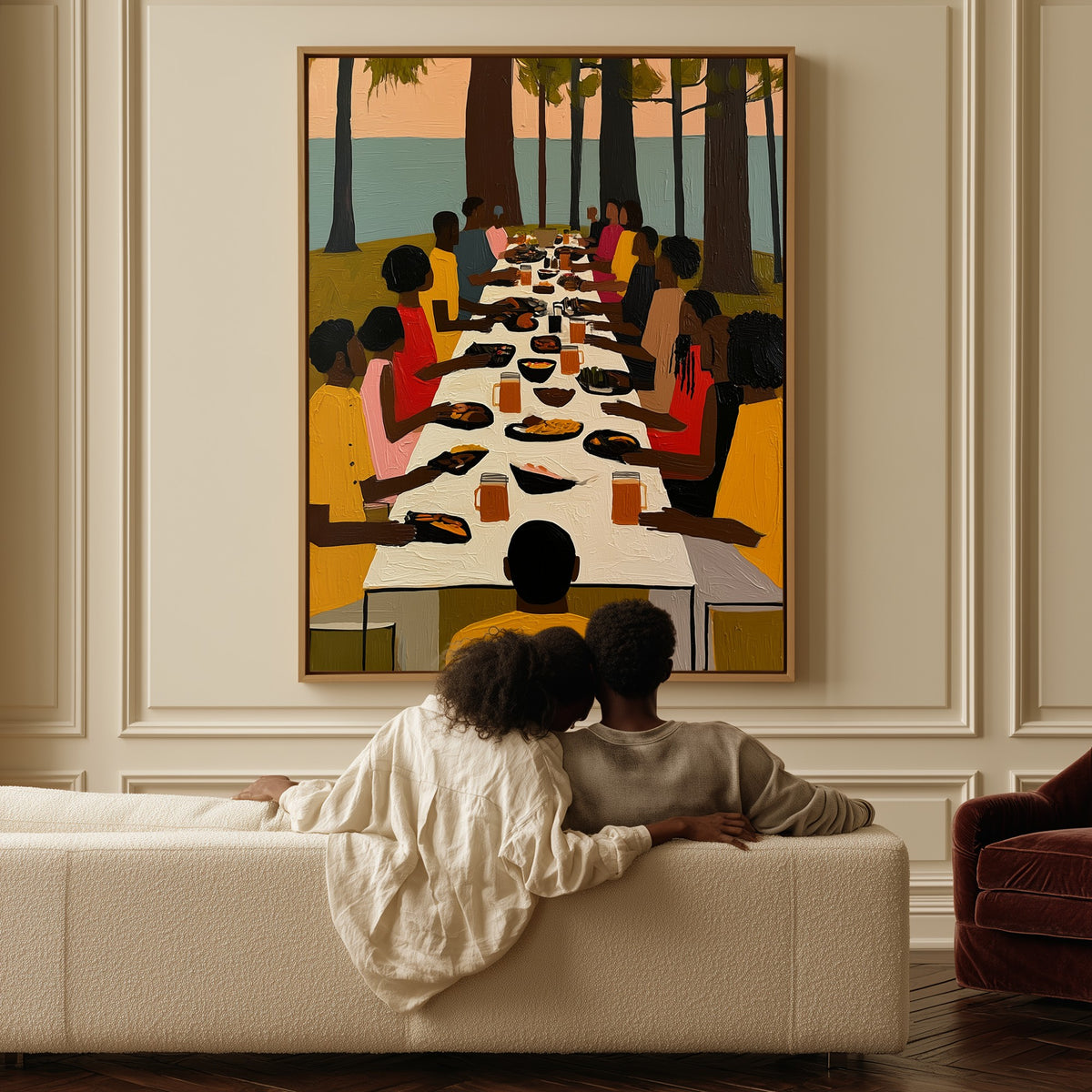 Supper Under the Pines canvas above a sofa, a couple sitting together