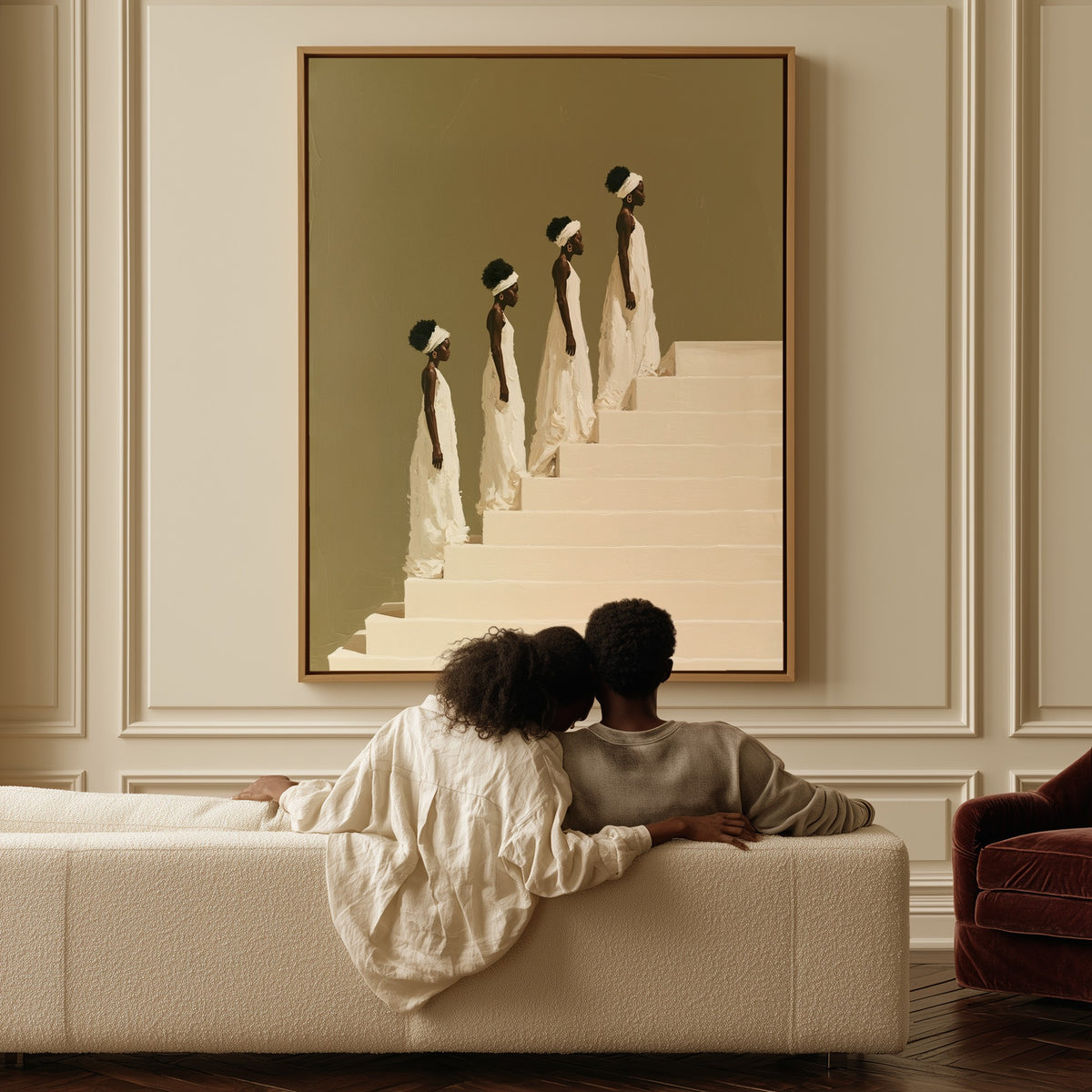 The Ascent canvas above a sofa, a couple sitting together