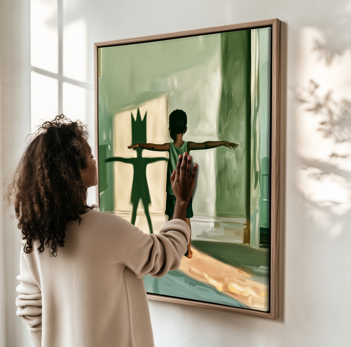 Wings at Noon framed canvas, a woman hanging it on a sunlit wall