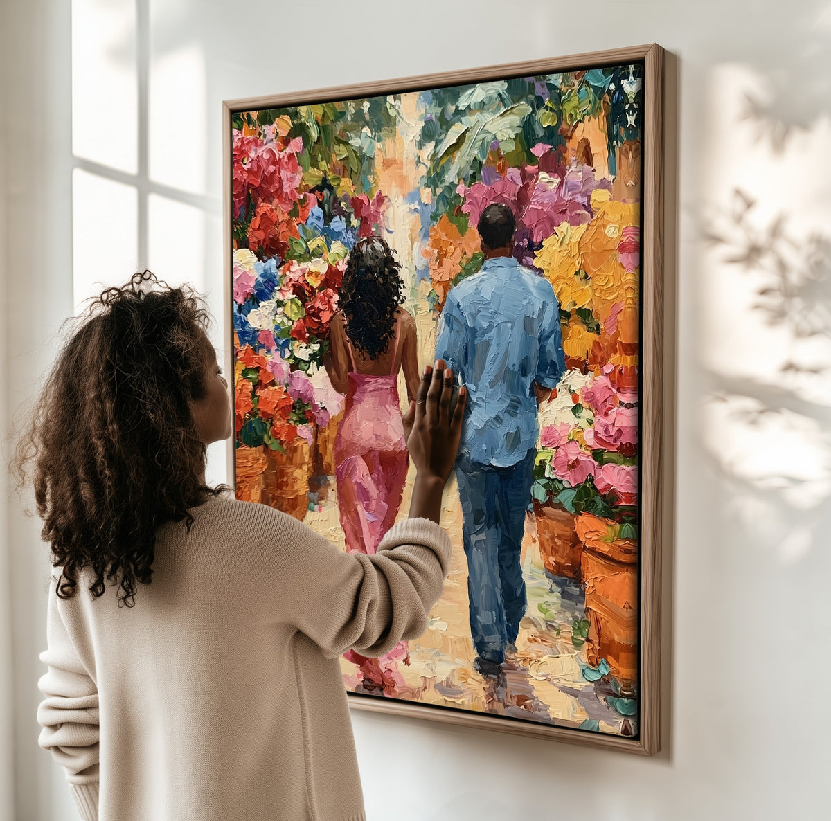 Through the Flower Market framed canvas, a woman hanging it on a sunlit wall