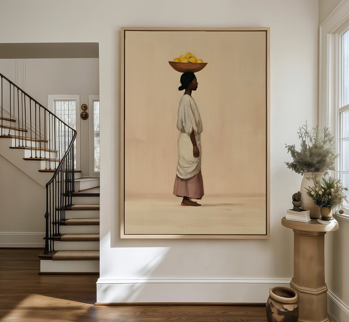 Balance framed canvas in an entryway by the stairs