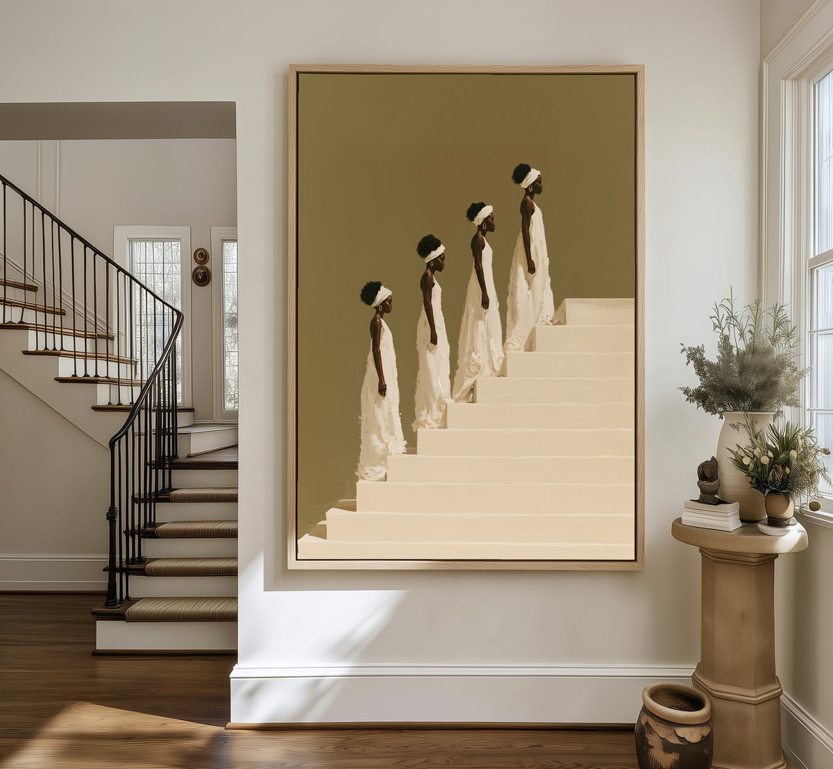The Ascent framed canvas in an entryway by the stairs
