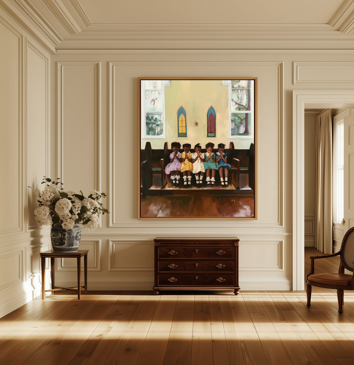 Sunday Pew canvas above a dark wood chest in a hallway