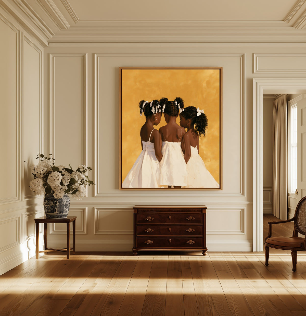 Three Sisters canvas above a dark wood chest in a hallway