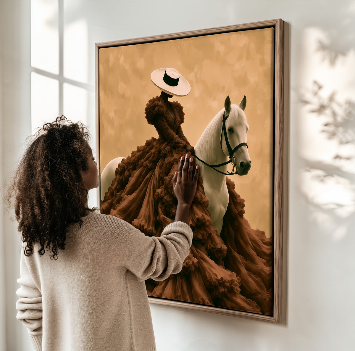 Lady in Chocolate Tulle framed canvas, a woman hanging it on a sunlit wall